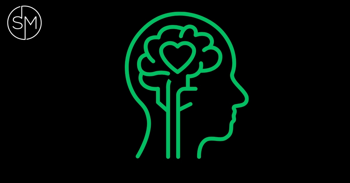 Green outline of a head with a heart and tree representing a calm trading mindset