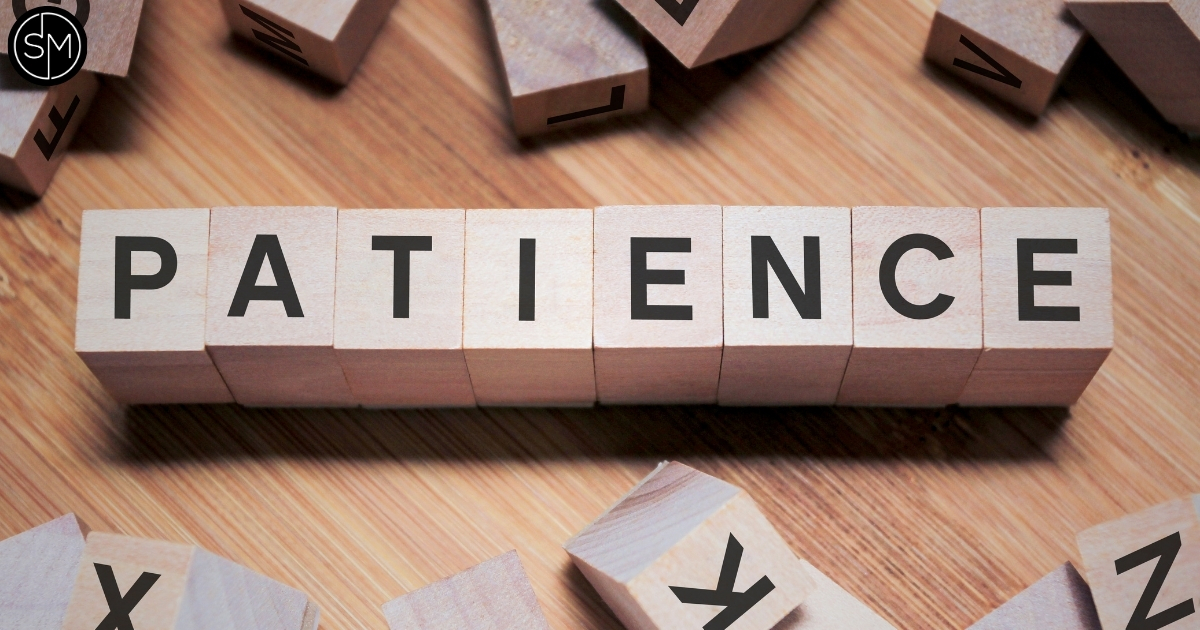 Patience blocks arranged on a wooden surface